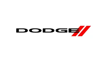 A dodge logo is shown on the side of a white wall.