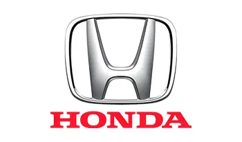 A honda logo is shown on the side of a car.